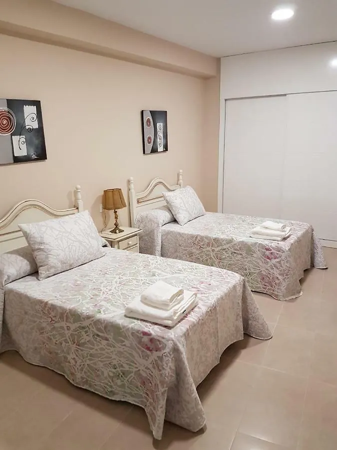Apartamentos Hela Arjona